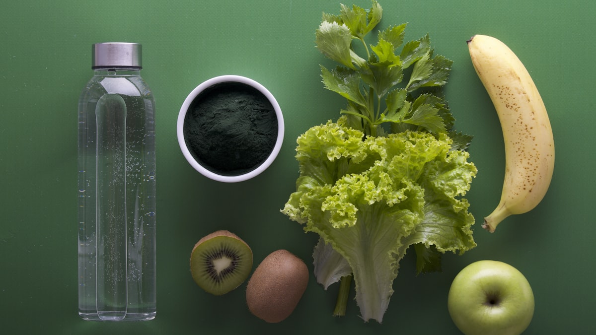assorted fruits and vegetables on green surface